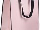 shopper in carta rosa con bordatura nera e maniglia nera in grosgrain