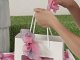 shopper in carta con finestra trasparente e manici in corda per bomboniere