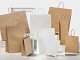 borse in carta kraft con maniglie intrecciate